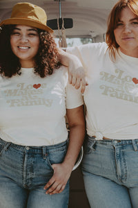 Two women wearing Love Makes a Family Shirt in Unisex by The Bee and The Fox