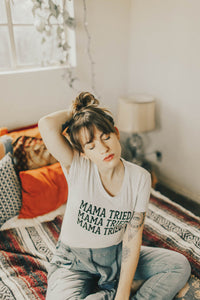 Woman sat on bed in Mama Tried Scoop Neck Shirt for Women by The Bee and The Fox